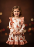 Girls Christmas Retro Ruffle Reindeer Twirl Dress with Matching Bow - Bowtism